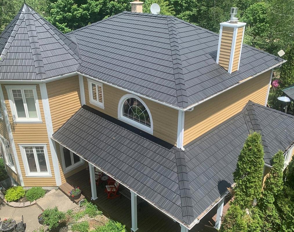 Chestermere Bungalow metal roof aerial view